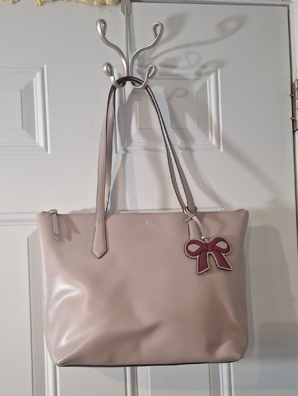 kate spade blush pink leather tote with bow charm